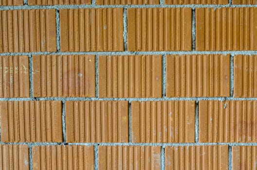 Closeup of brick wall in house under construction.