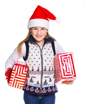 Christmas theme - Smiling cute girl in Santa's hat with gift box, isolated on white
