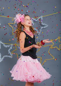 Fashion girl is wearing masquerade costume. Holiday theme/Emotion child.