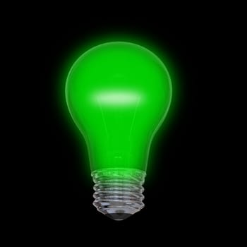 Glowing green lightbulb isolated on black background