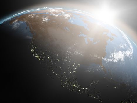Space view of the sun rising over North America on planet Earth. Elements of this image furnished by NASA.