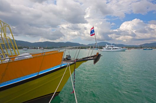 Ship in Andaman Sea on background of blue sky, Thailand.