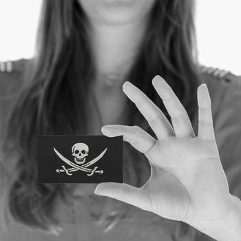 Woman in showing a business card, pirate