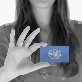 Woman in showing a business card, United Nations