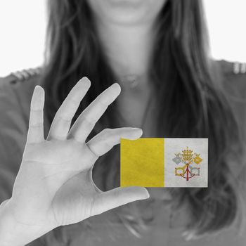 Woman showing a business card, Vatican City