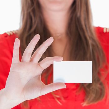 Woman in red showing a blank business card