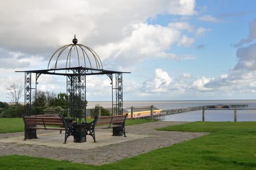 Seats overlooking coast and pier