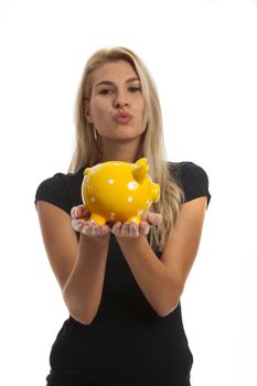 young woman with a piggy bank