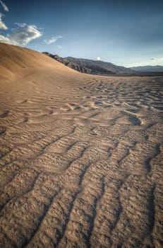 sand dune look like a wave in Death Valley scienic view in HDR