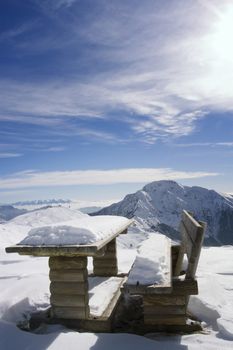 Bench in winter landscape