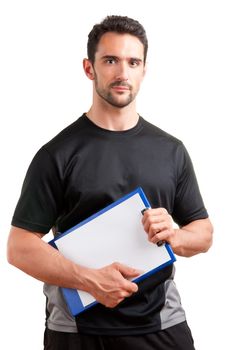 Personal Trainer, with a pad in his hand, isolated in white