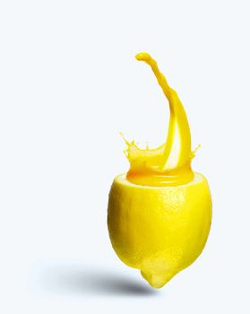Image of refreshing lemon cocktail with juicy splashes