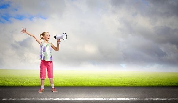 Image of little girl shouting into megaphone