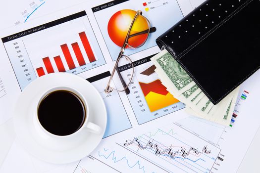 Close up image of office workplace with cup of coffee and documents