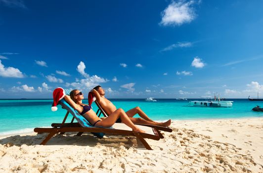 Couple on a tropical beach at Maldives