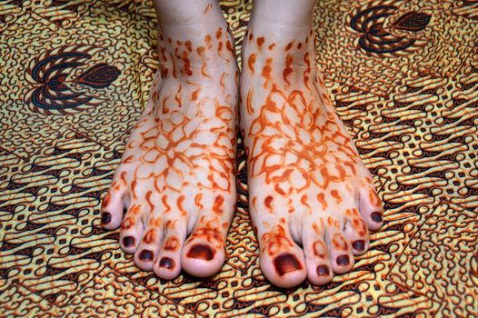 Henna On foots Of Indonesian Wedding Bride