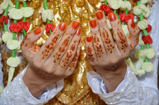 Henna On Hands Of Indonesian Wedding Bride