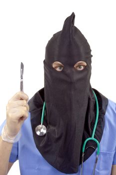 Creative on negligence in surgery. A doctor in a mask executioner.