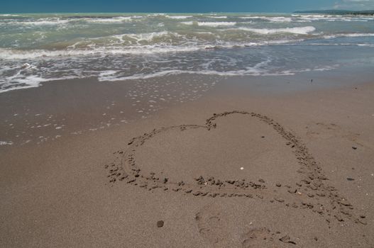 Very big love heart shape on the beach