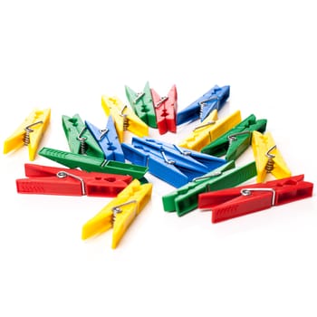 Closeup image of little colorful clothespins on a white background