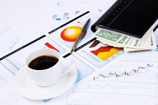 Close up image of office workplace with cup of coffee and documents