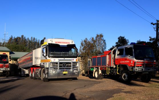 REGENTVILLE, AUSTRALIA - OCTOBER 23, 2013:  Rural Fire Service Cumberland Zone Headquarters,  Regentville, trucks and vehicles at standy to fight local bushfires.