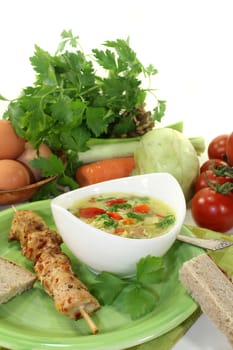 a chicken soup with egg and parsley