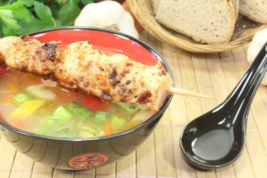 hot Asian Chicken consomme in a bowl
