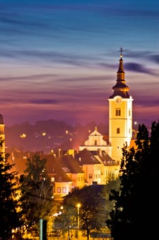 Church tower in colorful dusk, Town of Krizevci, Croatia