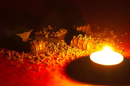 Eating delicious selfmade pralines by candlelight