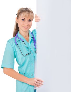a female doctor holding copyspace board