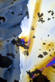Soot particles and microcrystals in polarized light