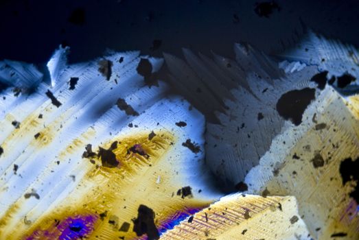 Soot particles and microcrystals in polarized light