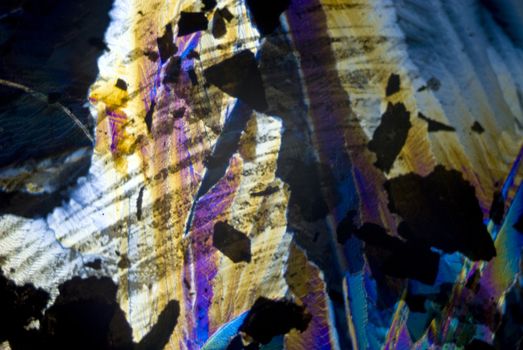 Soot particles and microcrystals in polarized light
