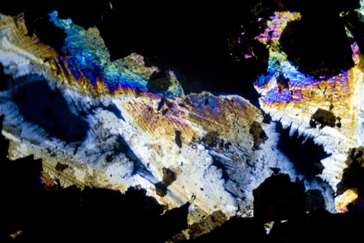 Soot particles and microcrystals in polarized light
