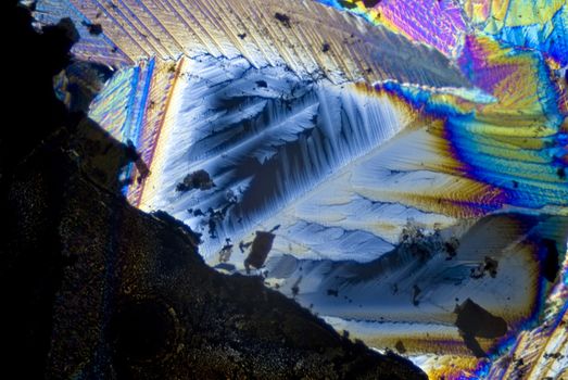 Soot particles and microcrystals in polarized light