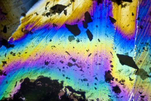 Soot particles and microcrystals in polarized light