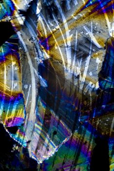 Soot particles and microcrystals in polarized light