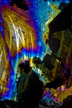 Soot particles and microcrystals in polarized light
