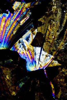 Soot particles and microcrystals in polarized light