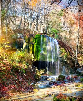 Beautiful waterfall Silver Jets at sunlight in autumn 