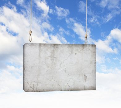 Image of cement blank banner hanging on ropes