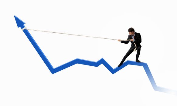 Image of businessman standing on graph and pulling it upwards