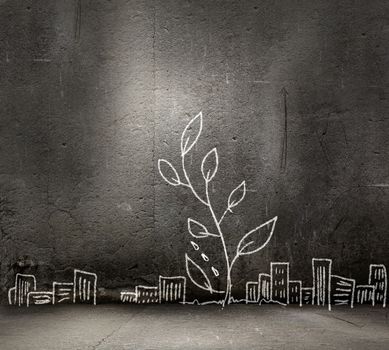 Image of businessman watering sprout with can