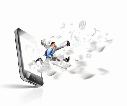 Image of businessman jumping out of mobile phone