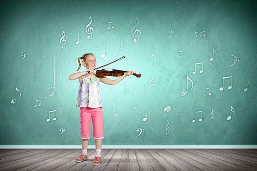 Image of cute girl playing violin against green background