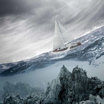 Submerged ocean view with yacht floating above