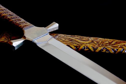 Image of cold weapon on black background