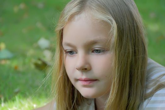 Portrait of beautiful girl with blue eyes