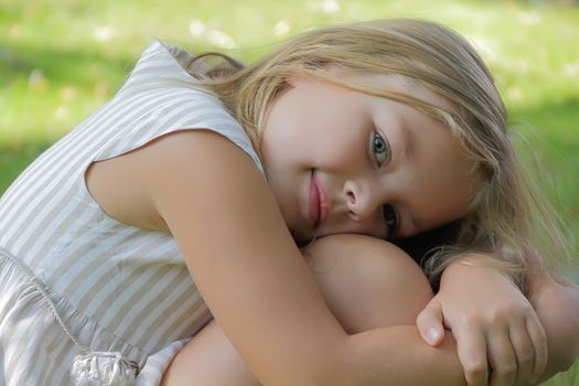 Portrait of beautiful girl with blue eyes